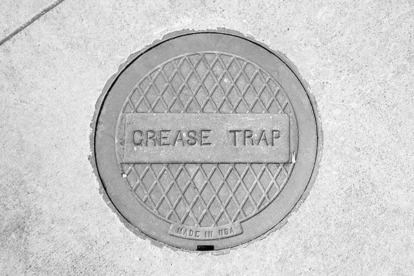 neglecting grease trap pumping can lead to sewer backups, foul odors, and costly plumbing repairs